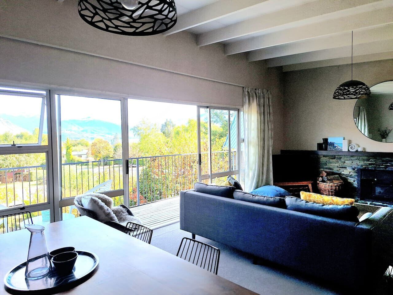 TV, fireplace, books