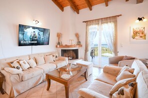 TV, fireplace, ping pong, books - Corfu Holiday Villa – Pool, Sea Views, Family Friendly (Kassiopi)