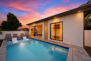 A heated pool - New! SunChaser • Brand 5BR New Luxury Build • Heated Pool • 1 Mile to Vanderbilt Beach! (Naples)
