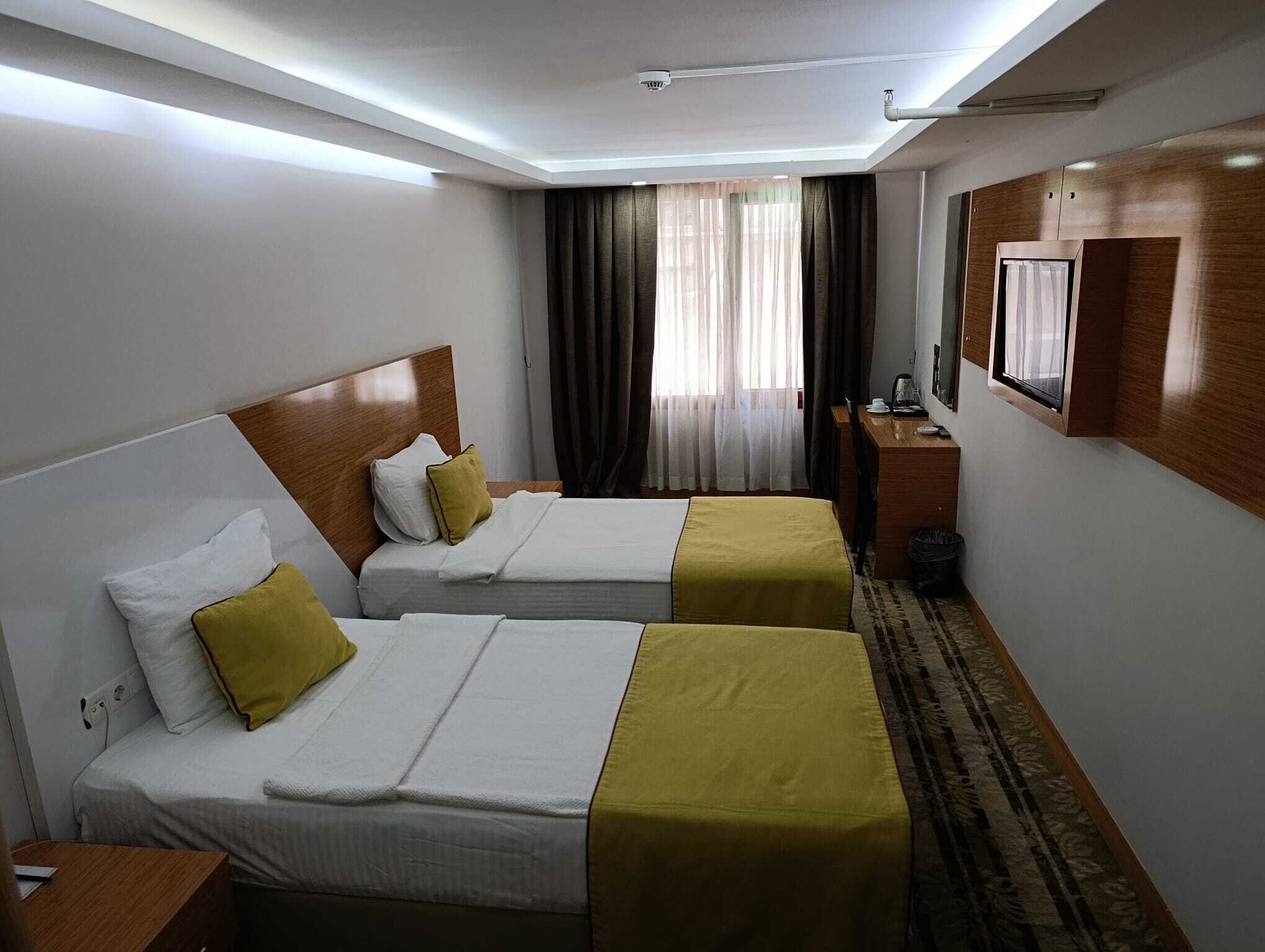 Standard Double or Twin Room | Desk, laptop workspace, blackout drapes, iron/ironing board