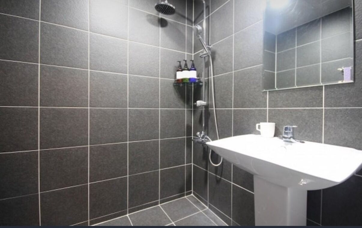 Basic Double Room | Bathroom | Shower, free toiletries, hair dryer, slippers
