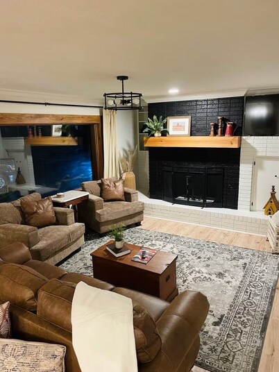 Luxury 4BR/3bath retreat on 2 private acres just minutes from town & interstate.