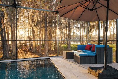 Luxury Lakefront Retreat w Pool, Balcony, Firepit, Dock, Orlando, FL Sleeps 12