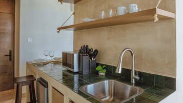 Fridge, coffee/tea maker, cookware/dishes/utensils