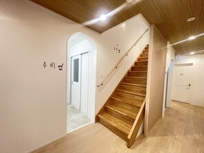 Shower, hair dryer, towels, shampoo