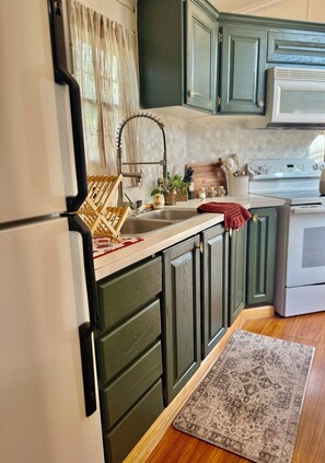 Microwave - Curated 1-bedroom bungalow near Lake Darbonne with cozy porch fire pit! (Farmerville)