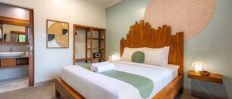 A modern bedroom with a wooden bed, a large mirror, a bedside table with a lamp, and a wall-mounted circular rug.