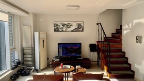 Apartment, City View, Mezzanine | Living area