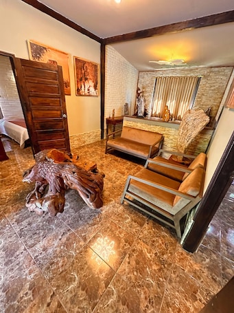 Family Villa, Balcony, Garden View | Blackout drapes, iron/ironing board, free WiFi, bed sheets