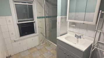 Shower, towels, soap, shampoo