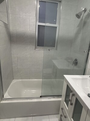 Shower, towels, soap, shampoo