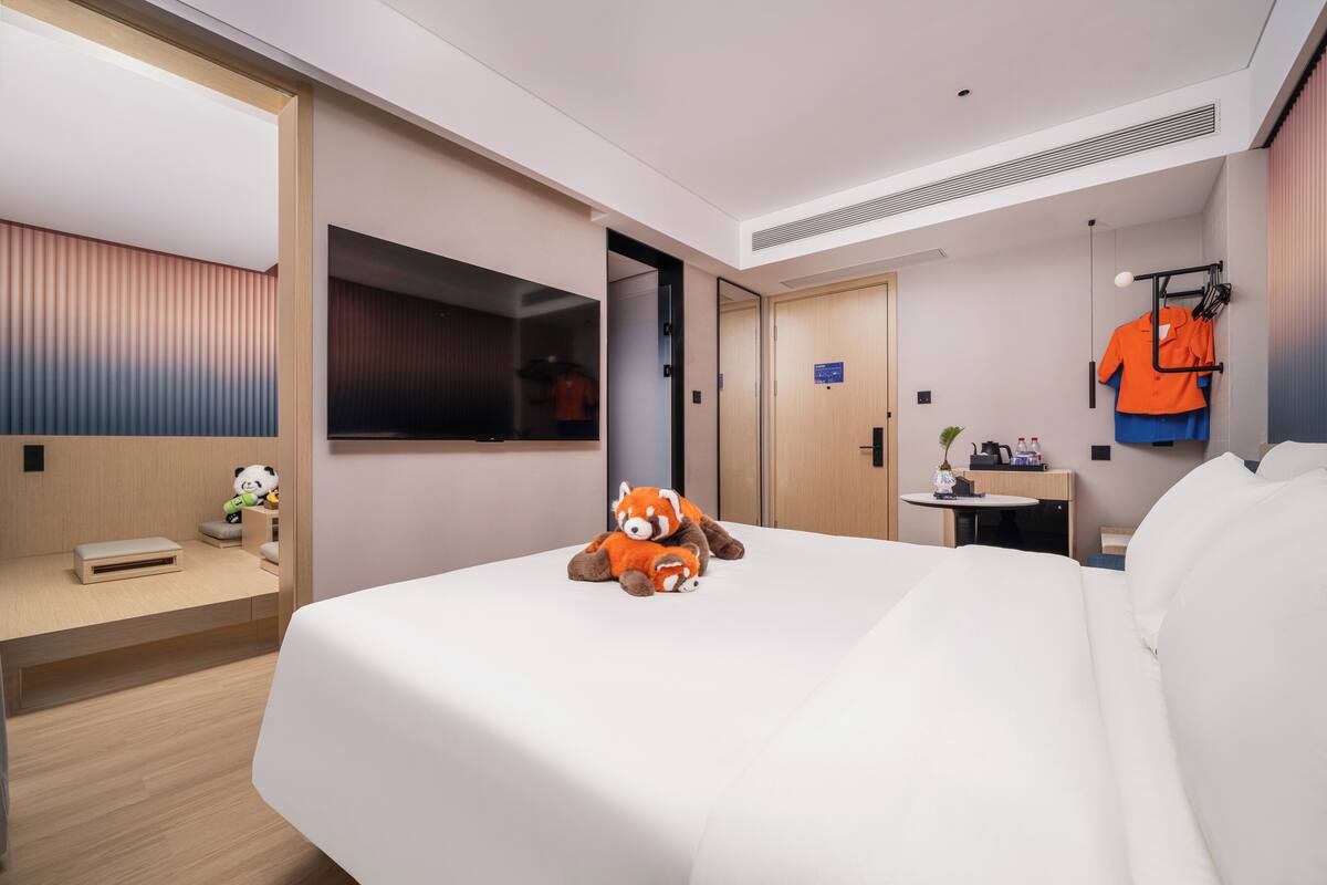 Habitación individual ejecutiva | Espacio para trabajar con laptop y wifi gratis