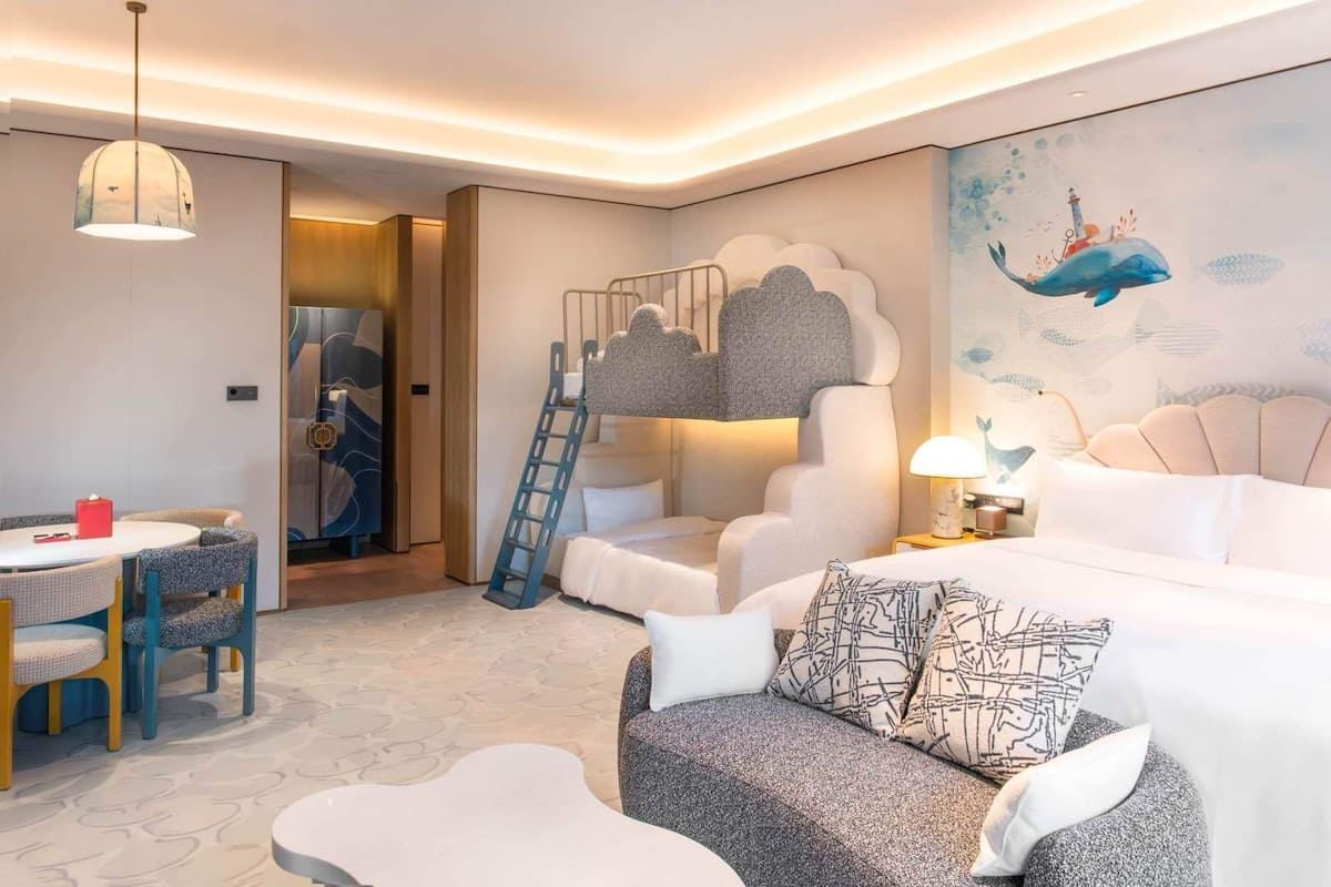 Family Room, Multiple Beds, Courtyard View, Courtyard Area | In-room safe, desk, laptop workspace, blackout drapes