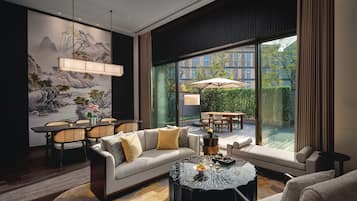 Nhà liên kế Deluxe, 1 phòng ngủ, được phép mang theo vật nuôi, quang cảnh sân vườn | Minibar với thức uống miễn phí, két bảo mật tại phòng, bàn