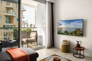 Appartement, vue partielle sur la mer | Coin séjour