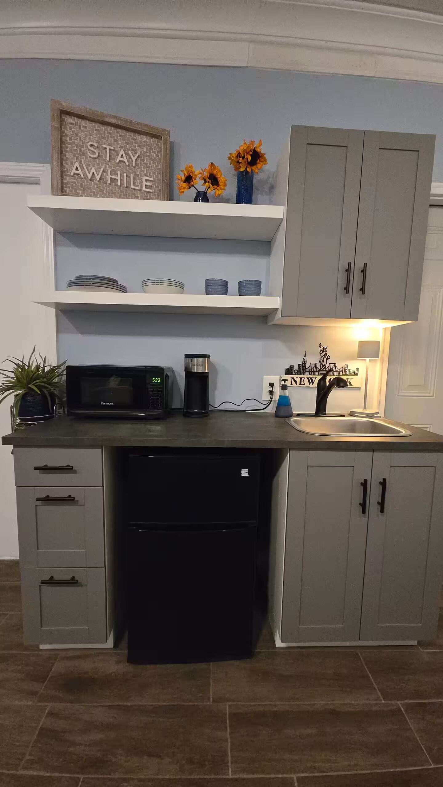 Fridge, microwave, coffee/tea maker, toaster