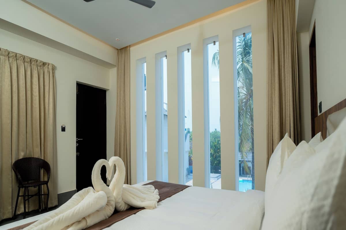 패밀리룸 | 이집트산 면 시트, 고급 침구, 무료 WiFi