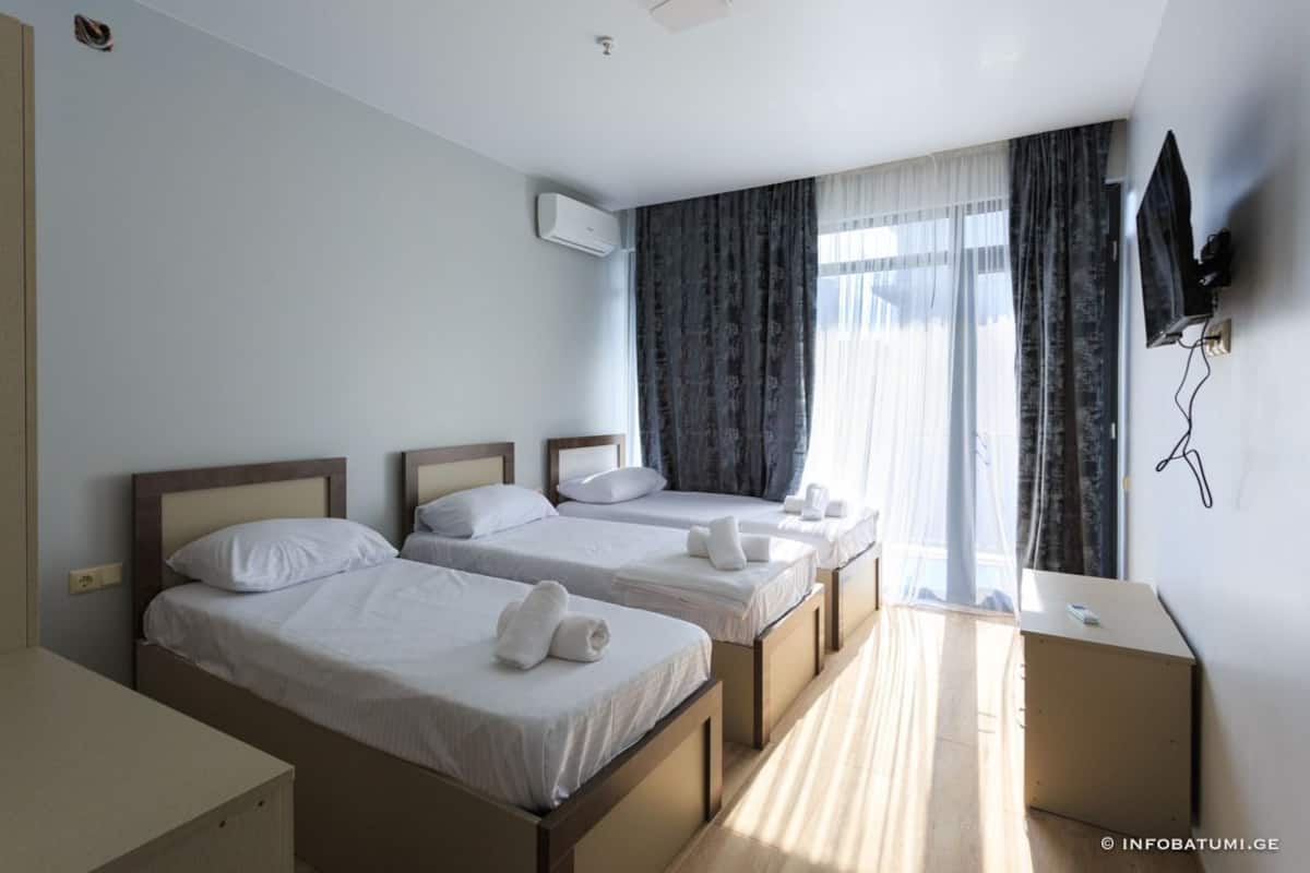 Classic Triple Room, Balcony | Free WiFi