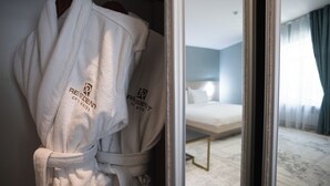 Family Room | In-room safe, desk, laptop workspace, iron/ironing board (on request) - Resident Hotel Gogol (Almaty)