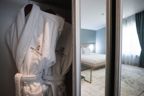 Family Room | In-room safe, desk, laptop workspace, iron/ironing board - Resident Hotel Gogol (Almaty)
