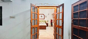 Cozy 1-bedroom, 1-bathroom homestay with all amenities & walkway for relaxation.