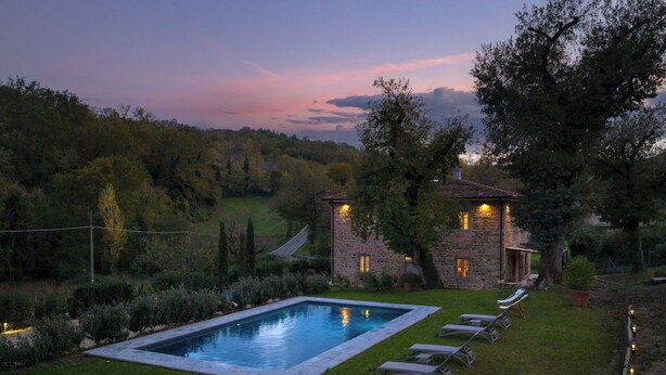 A stone house with a swimming pool, surrounded by a well-maintained lawn and trees. - Country House / Farm House in Olmi with 5 bedrooms sleeps 10 (Olmi)