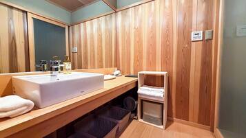Townhome | Bathroom | Hair dryer, slippers, towels, shampoo