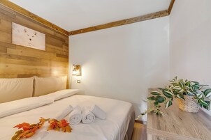 Apartamento família, vários quartos (Abeti Mountain View) | 1 quarto, Wi-Fi de cortesia, roupa de cama