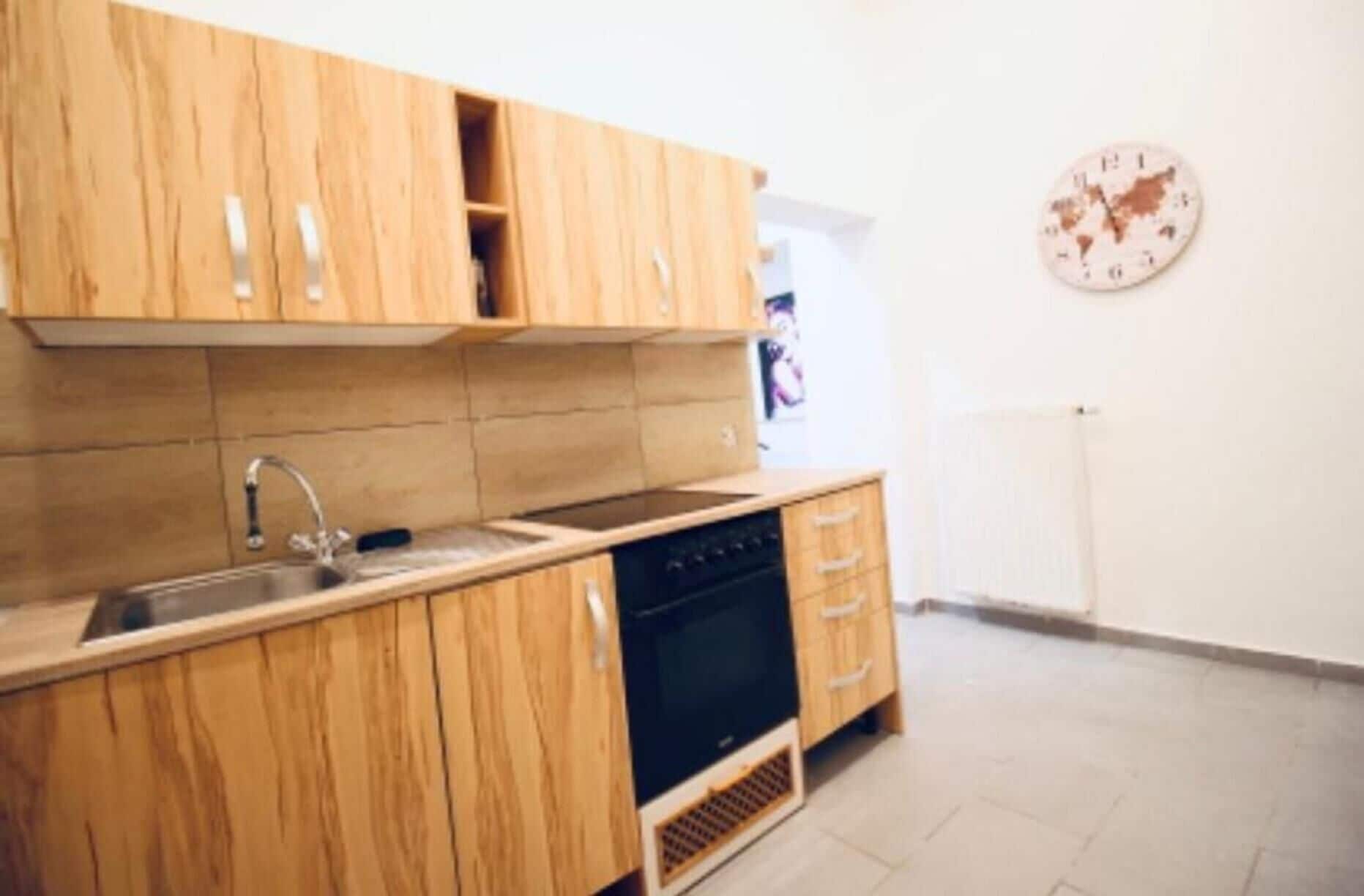 Apartamento básico | Cozinha privada | Fogão, cooktop, talheres/pratos/utensílios de cozinha