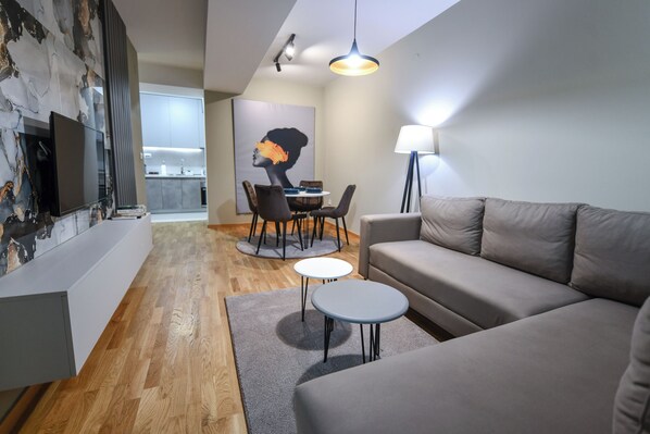 Smart TV, books - Elegant One-Bedroom Suite • New Building • Prime Location (Skopje)