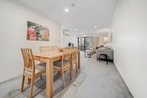 Dining - Central 2-bed Apartment with Pool, Gym and Spa (Braddon)