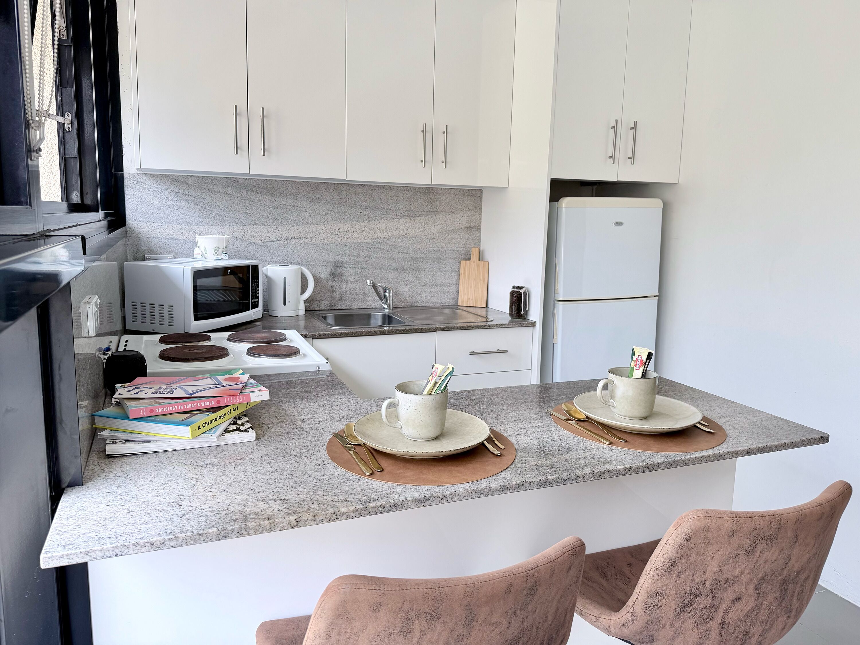 Fridge, microwave, stovetop, coffee/tea maker