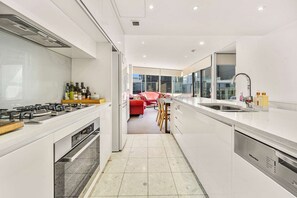 Fridge, microwave, oven, stovetop - Canberra Lakefront 2-Bed with Pool, (Kingston)