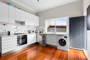 Fridge, microwave, oven, stovetop - Huge Harbour View Apartment In Historic Home (Cremorne)