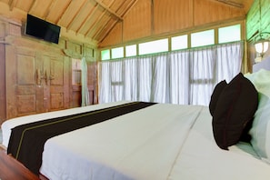 Bed sheets - OYO 95018 Anggrek Homestay Jogja Syariah (Sewon)