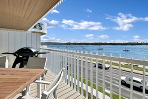 Outdoor dining - Modern 1-Bedroom Apt with Sweeping Water Views (Batemans Bay)