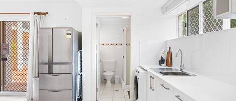 Fridge, microwave, stovetop, coffee/tea maker