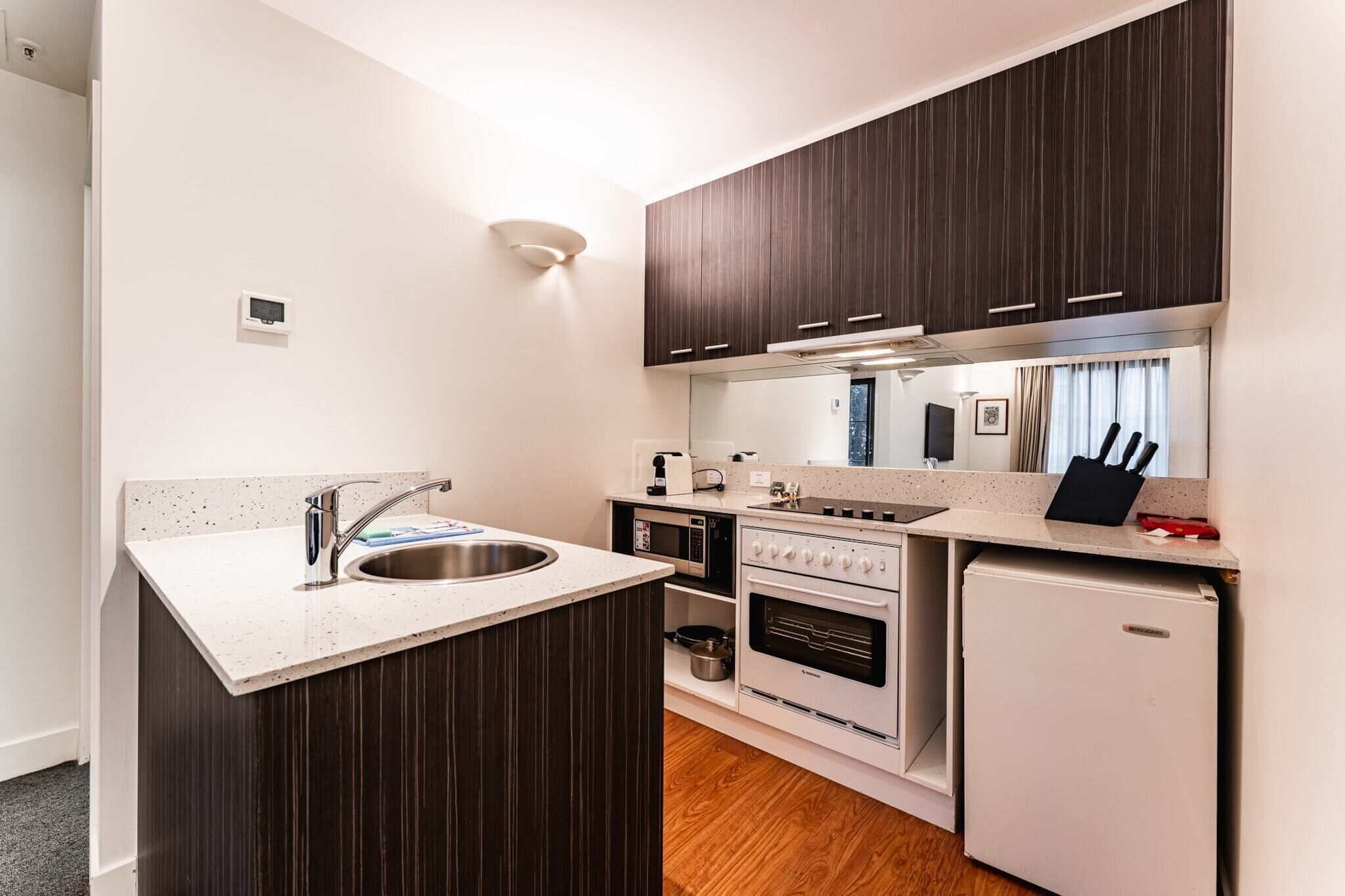 Coffee/tea maker, fridge, microwave, oven