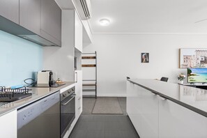 Fridge, microwave, oven, stovetop - Chic 1 Bed Inner-City Retreat with Pool and Views (Fortitude Valley)