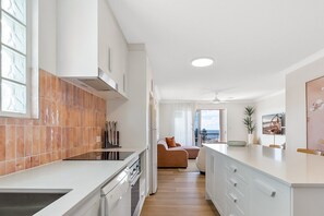 Fridge, microwave, oven, stovetop - Bright 2-Bed Apartment with Stunning Ocean Views (Kings Beach)