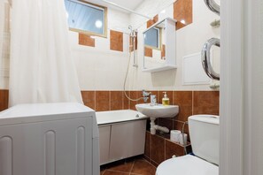 Familienapartment, Stadtblick | Badezimmer