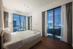 Family Suite, 3 Bedrooms, Club Lounge Access, City View | Egyptian cotton sheets, premium bedding, down comforters - Zenith Luxstay The Crest Residence (An Khanh)