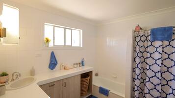 Shower, hair dryer, towels
