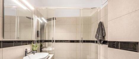 Hair dryer, towels, soap, shampoo