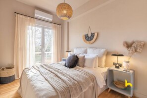 Desk, iron/ironing board, WiFi, bed sheets - Sun-Kissed Boho Haven with Whirlpool Bliss & Patio (Athina)