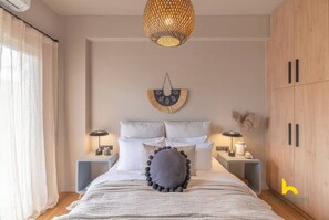 Desk, iron/ironing board, WiFi, bed sheets - Sun-Kissed Boho Haven with Whirlpool Bliss & Patio (Athina)