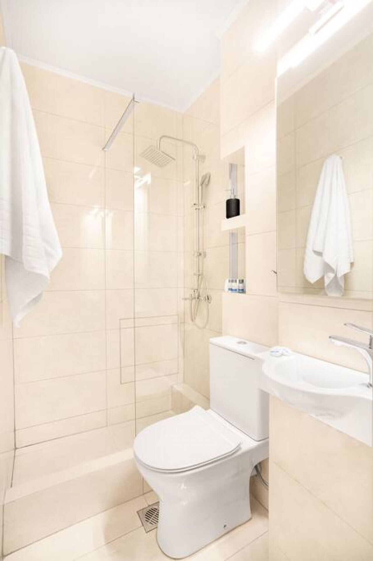 Hair dryer, towels, soap, shampoo