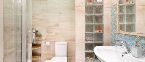Hair dryer, towels, soap, shampoo