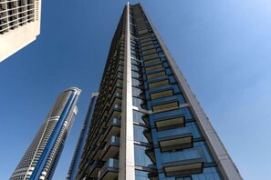 Exterior - Sky-High 2BR w/ City Views, Minutes Drive to Downtown, Steps from the Bus Stop (Dubai)