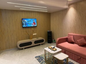 Luxury Studio Suite | Living area | 32-inch Smart TV with satellite channels - Sk Govindam (Jaipur)